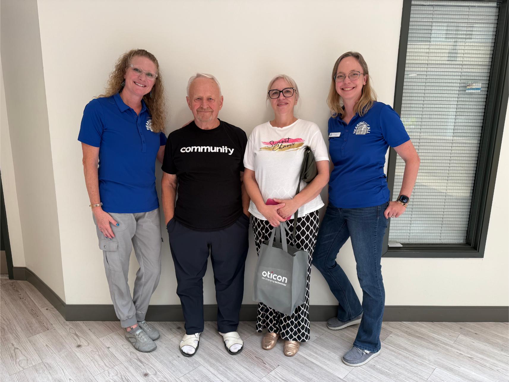New Leaf Hearing Care team with a rescue dog from Paws on the Ground Colorado